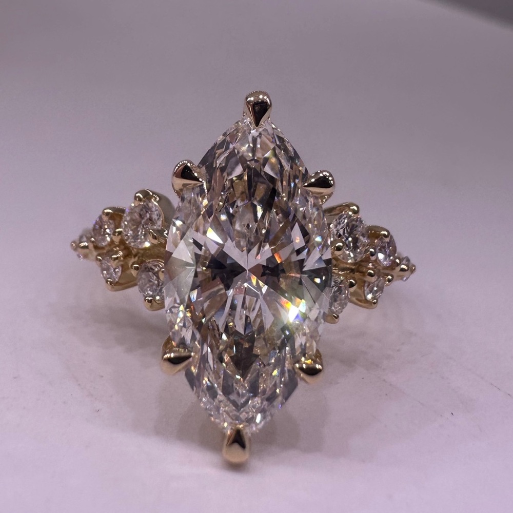 3.04 carat E VS1 marquise diamond engagement ring